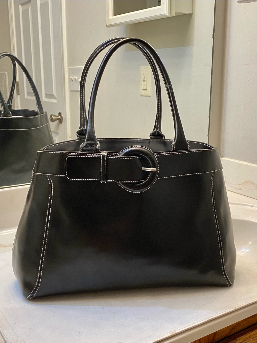 FURLA leather tote excellent condition clean interior looks new. Beautiful